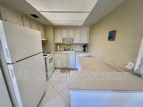88 Boundary Blvd in Rotonda West, FL - Foto de edificio - Building Photo