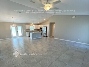 7049 David Blvd in Port Charlotte, FL - Foto de edificio - Building Photo