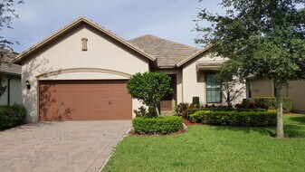 10538 Prato St in Wellington, FL - Building Photo