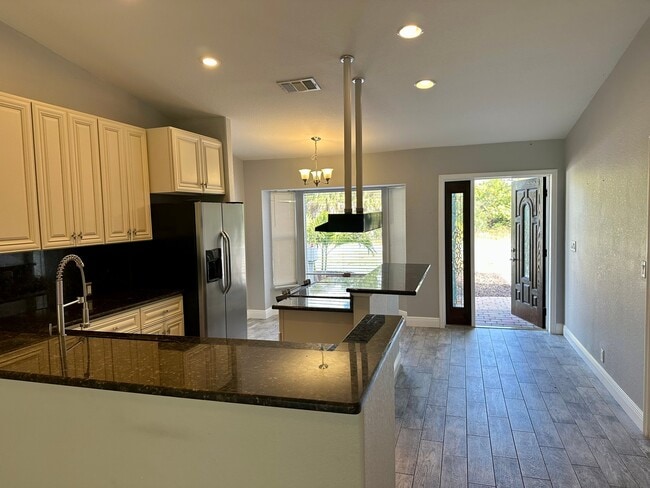 473 Flamingo Blvd, Unit A in Port Charlotte, FL - Foto de edificio - Building Photo
