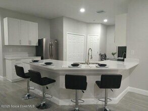 571 San Filippo Dr SE in Palm Bay, FL - Building Photo - Building Photo