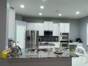 9736 Osprey Landing Dr in Orlando, FL - Building Photo - Building Photo