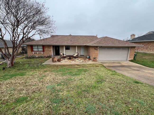 property at 303 E 6th St
