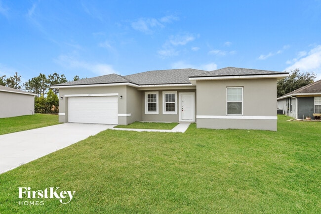 1293 N Platte Ct in Poinciana, FL - Foto de edificio - Building Photo