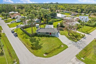 5854 SE Orange Blossom Trail in Hobe Sound, FL - Building Photo