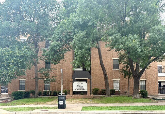 property at 203 E 31st St
