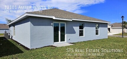 12101 Amber Waves Rd in Lehigh Acres, FL - Building Photo - Building Photo
