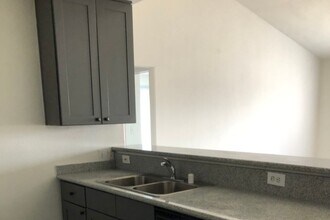 15057 Burbank Blvd, Unit 8 in Van Nuys, CA - Building Photo - Building Photo