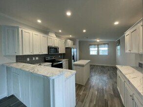 988 Xanadu E in Venice, FL - Building Photo - Building Photo