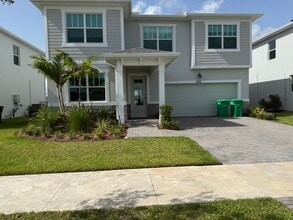 14114 SW Surina St in Port St. Lucie, FL - Building Photo - Building Photo