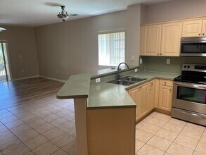 5051 SE Mariner Garden Cir in Stuart, FL - Building Photo - Building Photo