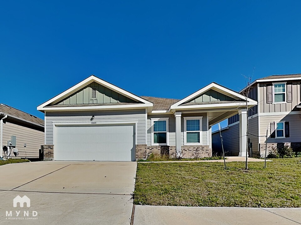 12608 Henry Clay Dr in Manor, TX - Building Photo
