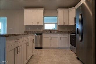 409 Moore Ave in Lehigh Acres, FL - Building Photo - Building Photo