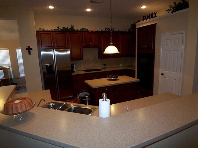 property at 23610 Whispering Wind