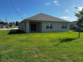 2098 SW Altman Ave in Port St. Lucie, FL - Building Photo - Building Photo