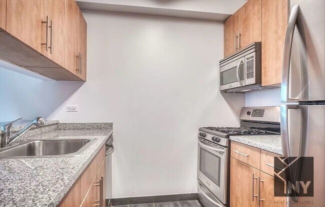 2 Maiden Ln, Unit 1510 in New York, NY - Foto de edificio - Building Photo