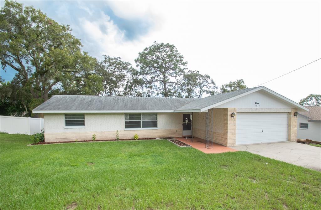 1379 Newhope Rd in Spring Hill, FL - Building Photo