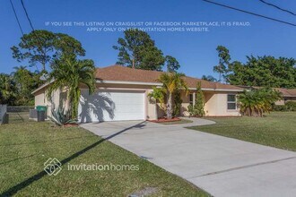 833 SE Lansdowne Ave in Port St. Lucie, FL - Foto de edificio - Building Photo