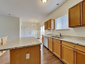 15833 E 98th Pl in Commerce City, CO - Building Photo - Building Photo