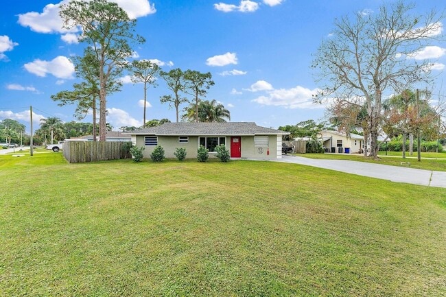 5854 SE Orange Blossom Trail in Hobe Sound, FL - Building Photo - Building Photo