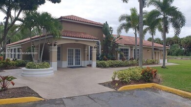 1251 Benoist Farms Rd, Unit 304 in West Palm Beach, FL - Building Photo - Building Photo
