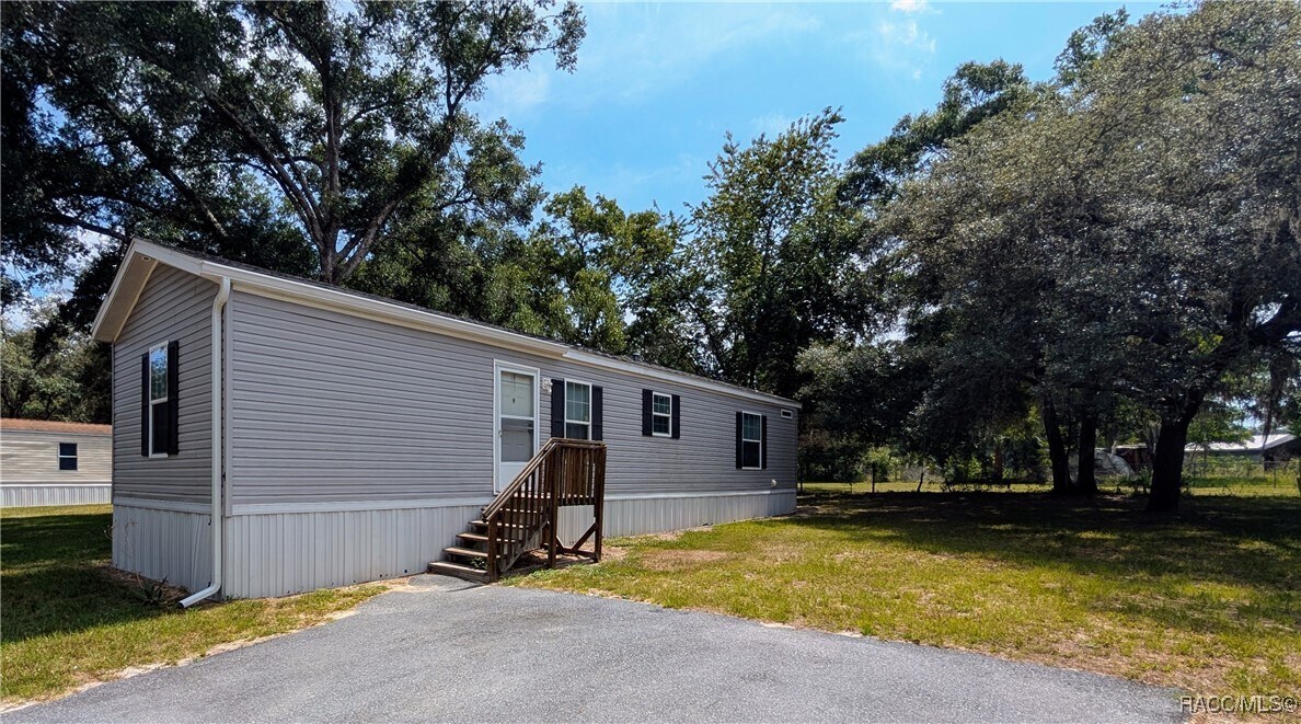 7090 N Palmer Way in Hernando, FL - Building Photo