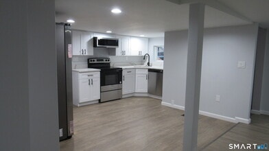 17 Woodbine St in Torrington, CT - Building Photo - Building Photo