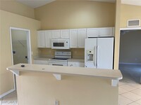 409 La Perouse St in Lehigh Acres, FL - Building Photo - Building Photo