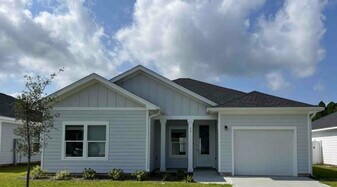 13 Alexander Way in Freeport, FL - Building Photo