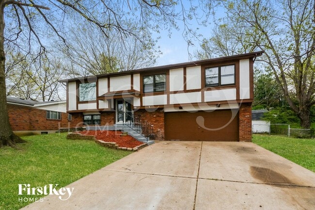 5707 Hidden Cove Ln in Florissant, MO - Foto de edificio - Building Photo