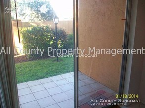 8911 Blind Pass Rd-Unit -111 in St Pete Beach, FL - Building Photo - Building Photo
