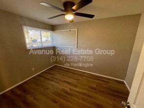 8330 Woodhurst Dr in Berkeley, MO - Building Photo - Building Photo