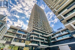 65 Broadway Ave in Toronto, ON - Building Photo