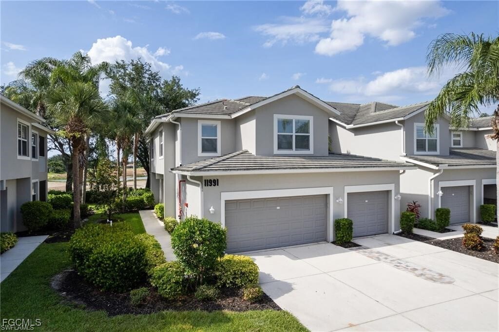 11991 Champions Green Way in Ft. Myers, FL - Building Photo