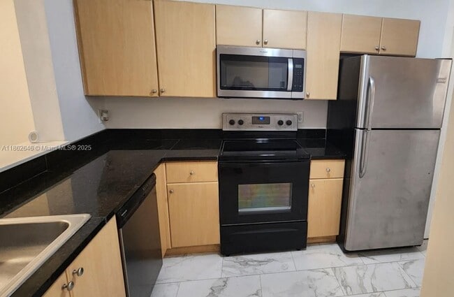 property at 902 NE 209th St