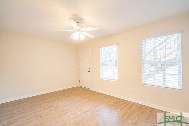 property at 402 E 3rd St
