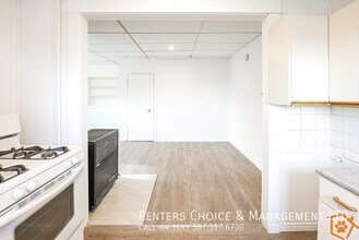 Cat-Friendly Downtown Taber Apartment with Laundry Access in Taber, AB - Building Photo - Building Photo