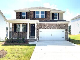 1674 Soapstone Rd in Dacula, GA - Building Photo