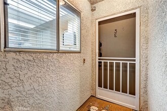 3365 Punta Alta, Unit 3E in Laguna Woods, CA - Building Photo - Building Photo