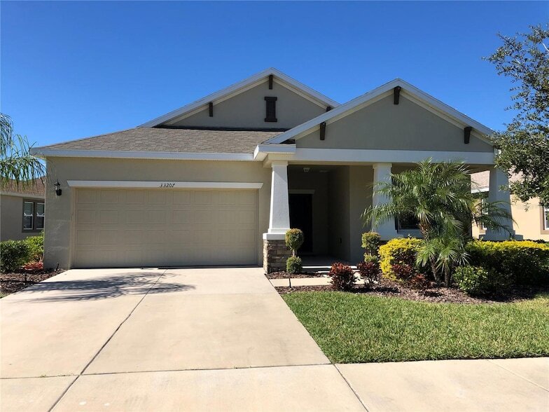 33207 Whisper Pointe Dr in Wesley Chapel, FL - Building Photo