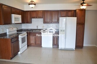5995 W Hampden Ave in Denver, CO - Building Photo - Building Photo