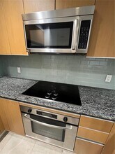 1050 Brickell Ave, Unit 1406 in Miami, FL - Building Photo - Building Photo