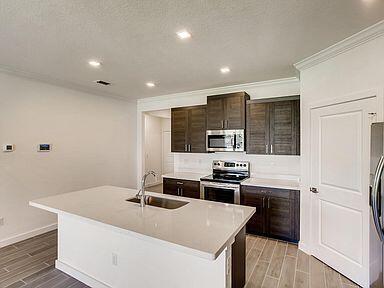 1343 NE White Pine Terrace in Ocean Breeze, FL - Building Photo - Building Photo