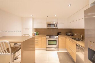 1627 Brickell Ave, Unit 2402 in Miami, FL - Building Photo - Building Photo