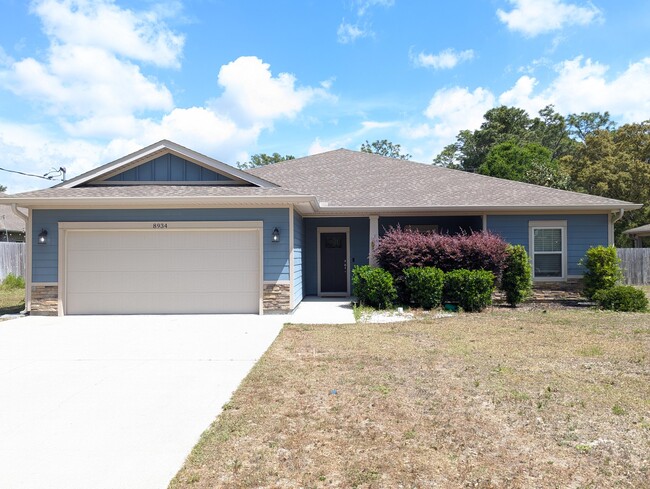property at 8934 E River Dr