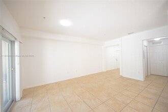 10870 NW 88th Ter, Unit 209 in Doral, FL - Building Photo - Building Photo