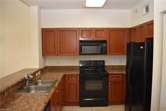 10126 Villagio Palms Way-Unit -205 in Estero, FL - Building Photo - Building Photo