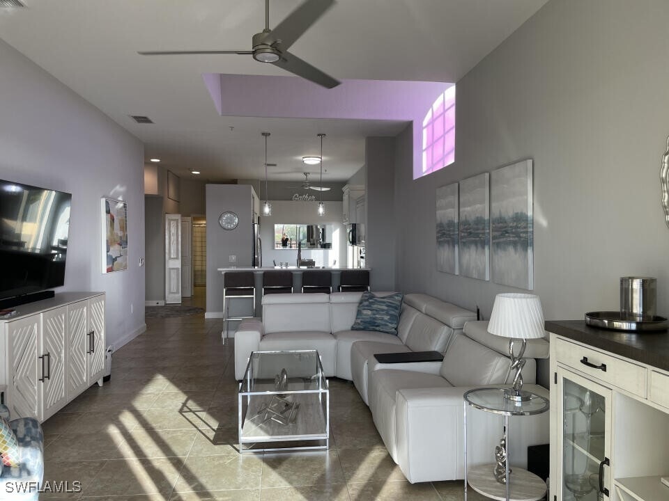 8597 Via Garibaldi Cir in Estero, FL - Building Photo