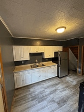 10052 Railroad St, Unit Apartment #1 in Lake City, PA - Foto de edificio - Building Photo