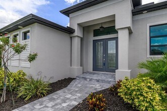 9445 Galaxie Cir in Port Charlotte, FL - Building Photo - Building Photo